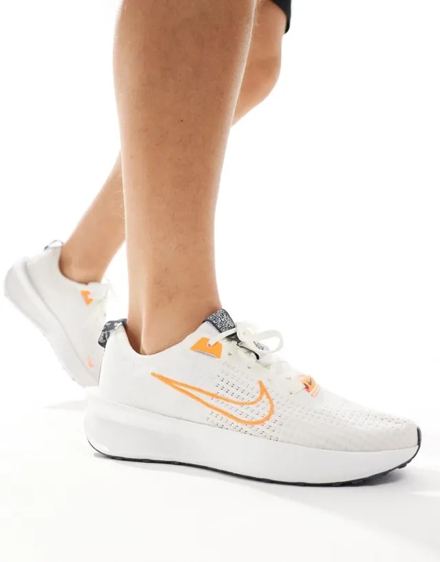 Nike Running Interact Trainers In White And Orange