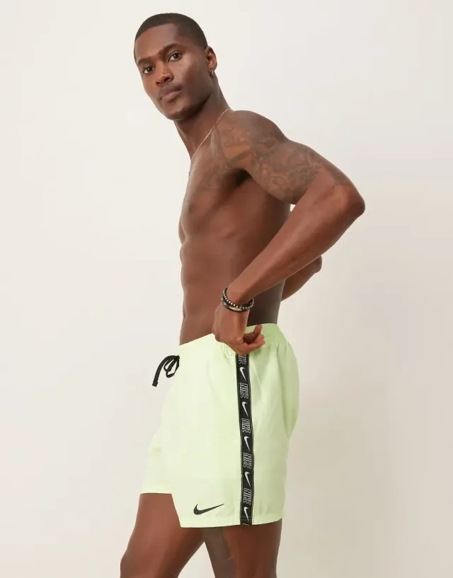Nike Swimming Logo Tape 5 inch volley swim shorts in vapor green