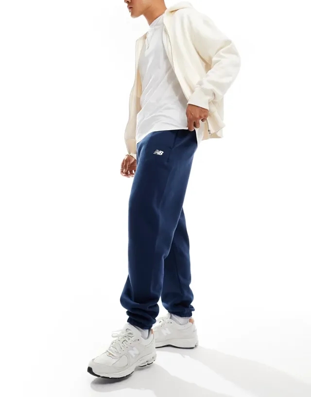 New Balance Men's Sport Essentials Fleece Jogger in Blue Cotton