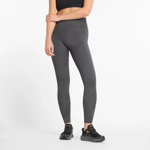 New Balance Women's Athletics Reflective Warming High Rise Legging 27 in Black Poly Knit