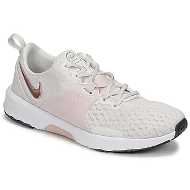 Nike  CITY TRAINER 3  women's Sports Trainers (Shoes) in Gold
