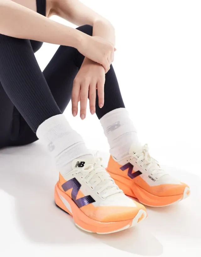 New Balance Fuel Cell Rebel V4 Running Trainers In Orange