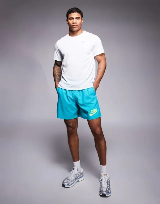 Nike Running Run Energy Challenger 7 Inch Shorts In Blue-Purple