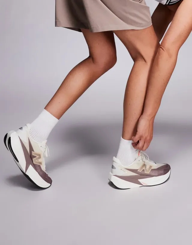 New Balance Fuelcell Rebel V5 Women's Running Trainers In Brown And Beige
