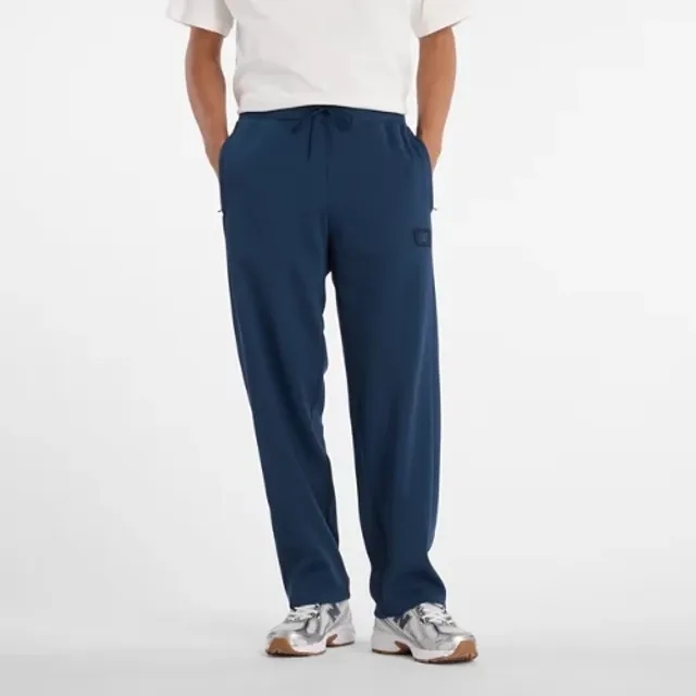 New Balance Men's Post Season Pique Track Pant in Blue Poly Knit